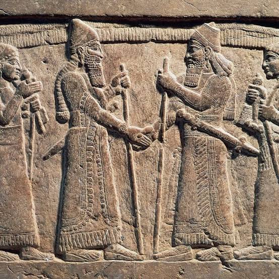 The 9th-century BC Assyrian relief from Nimrud showing King Shalmaneser III's handclasp